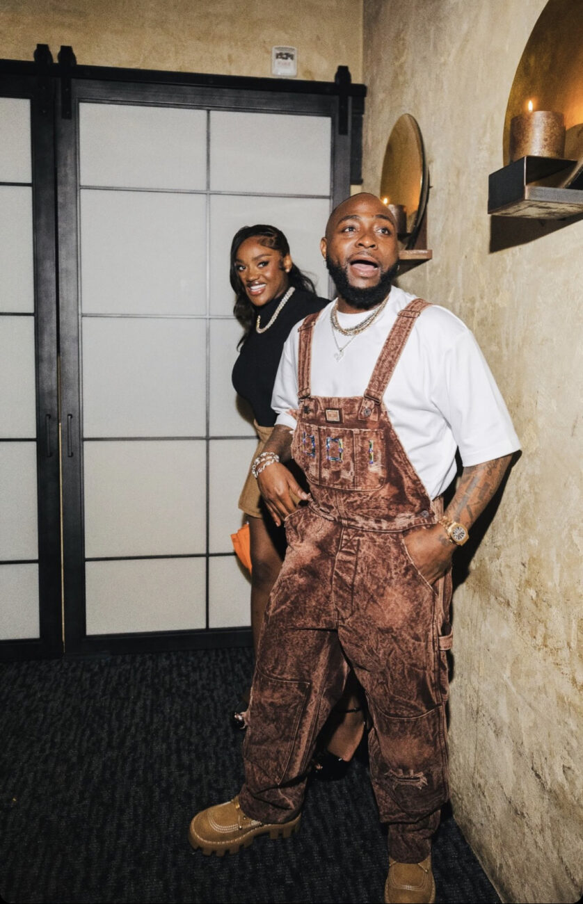 Davido is all smiles in a picture frame with his wife Chef Chi